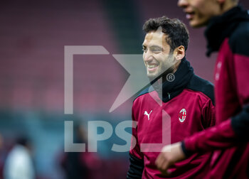 2021-01-12 - Hakan Calhanoglu of AC Milan warms up - AC MILAN VS TORINO FC - ITALIAN CUP - SOCCER