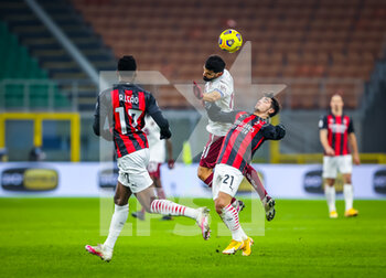 2021-01-12 - Thomas Rincon of Torino FC fights for the ball against Brahim Diaz of AC Milan - AC MILAN VS TORINO FC - ITALIAN CUP - SOCCER