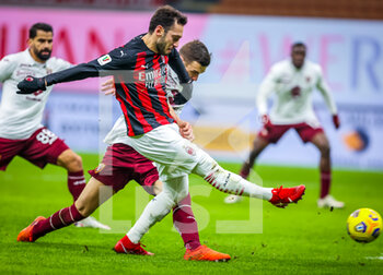 2021-01-12 - Hakan Calhanoglu of AC Milan in action - AC MILAN VS TORINO FC - ITALIAN CUP - SOCCER