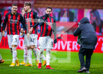 2021-01-12 - Hakan Calhanoglu of AC Milan celebrates with his teammates - AC MILAN VS TORINO FC - ITALIAN CUP - SOCCER