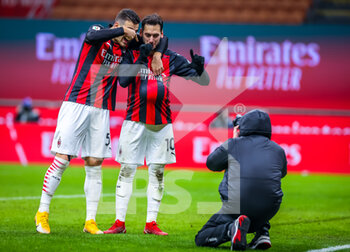 2021-01-12 - Hakan Calhanoglu of AC Milan celebrates victory - AC MILAN VS TORINO FC - ITALIAN CUP - SOCCER
