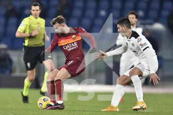 2021-01-19 - ROME, ITALY - January 19 : Gonzalo Villar (L) of AS Roma competes for the ball Ardian Ismajli( R ) of Spezia during the round eighths football Tim Cup soccer match between AS Roma and Spezia Stadio Olimpico on January 19,2021 in Rome Italy - AS ROMA VS SPEZIA CALCIO - ITALIAN CUP - SOCCER