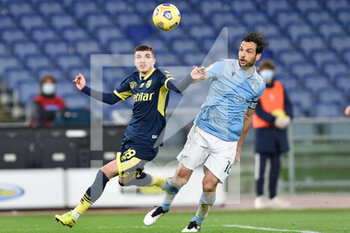 2021-01-21 - ROME, ITALY - January 21 : Marco Parolo (R) of SS Lazio in action against Valentin Mihai Mihaila (L) of Parma during the eighths TIM Cup soccer match between SS Lazio and Parma Stadio Olimpico on January 21,2021 in Rome, Italy  - SS LAZIO VS PARMA CALCIO - ITALIAN CUP - SOCCER