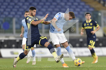 2021-01-21 - ROME, ITALY - January 21 : Simon Salomon Sohm (L) of Parma in action against Serjei Milinkovic (R) of SS Lazio during the eighths TIM Cup soccer soccer match between SS Lazio and Parma Stadio Olimpico on January 21,2021 in Rome, Italy  - SS LAZIO VS PARMA CALCIO - ITALIAN CUP - SOCCER