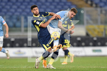 2021-01-21 - ROME, ITALY - January 21 : Simon Salomon Sohm (L) of Parma in action against Serjei Milinkovic (R) of SS Lazio during the eighths TIM Cup soccer soccer match between SS Lazio and Parma Stadio Olimpico on January 21,2021 in Rome, Italy  - SS LAZIO VS PARMA CALCIO - ITALIAN CUP - SOCCER