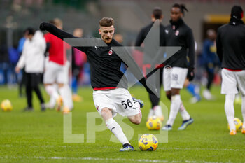2021-01-26 - Alexis Saelemaekers (AC Milan) warming up before the match starts - FC INTERNAZIONALE VS AC MILAN - ITALIAN CUP - SOCCER