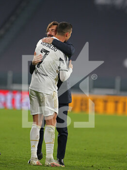 2021-02-09 - Andrea Pirlo (coach Juventus FC) celebrates with Cristiano Ronaldo (Juventus FC) - JUVENTUS FC VS FC INTERNAZIONALE - ITALIAN CUP - SOCCER
