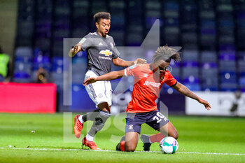 2020-09-22 - Manchester United midfielder Jesse Lingard (14) tussles with Luton Town defender Peter Kioso (20) during the English League Cup, EFL Carabao Cup, football match between Luton Town and Manchester United on September 22, 2020 at Kenilworth Road in Luton, England - Photo Nigel Keene / ProSportsImages / DPPI - LUTON TOWN VS MANCHESTER UNITED - ENGLISH LEAGUE CUP - SOCCER