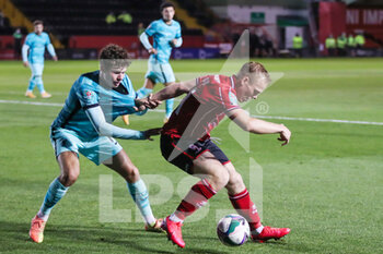 2020-09-24 - Lincoln City forward Anthony Scully (11) and Liverpool defender Neco Williams (76) during the English League Cup, EFL Carabao Cup, football match between Lincoln City and Liverpool on September 24, 2020 at Sincil Bank in Lincoln, England - Photo Shaun Conway / ProSportsImages / DPPI - LINCOLN CITY VS LIVERPOOL - ENGLISH LEAGUE CUP - SOCCER