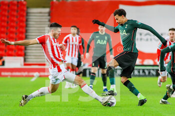 2020-12-23 - Stoke City defender Danny Batth and Tottenham Hotspur midfielder Dele Alli during the English League Cup, EFL Cup quarter-final football match between Stoke City and Tottenham Hotspur on December 23, 2020 at the Bet365 Stadium in Stoke-on-Trent, England - Photo kevin Warburton - A Moment in Sport / ProSportsImages / DPPI - STOKE CITY VS TOTTENHAM HOTSPUR - ENGLISH LEAGUE CUP - SOCCER