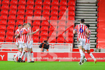2020-12-23 - Stoke players celebrate a goal during the English League Cup, EFL Cup quarter-final football match between Stoke City and Tottenham Hotspur on December 23, 2020 at the Bet365 Stadium in Stoke-on-Trent, England - Photo kevin Warburton - A Moment in Sport / ProSportsImages / DPPI - STOKE CITY VS TOTTENHAM HOTSPUR - ENGLISH LEAGUE CUP - SOCCER