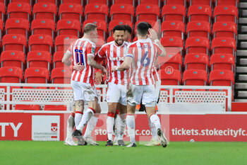 2020-12-23 - Stoke players celebrate after scoring to make it 1-1 during the English League Cup, EFL Cup quarter-final football match between Stoke City and Tottenham Hotspur on December 23, 2020 at the Bet365 Stadium in Stoke-on-Trent, England - Photo kevin Warburton - A Moment in Sport / ProSportsImages / DPPI - STOKE CITY VS TOTTENHAM HOTSPUR - ENGLISH LEAGUE CUP - SOCCER