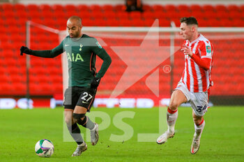 2020-12-23 - Tottenham Hotspur midfielder Lucas Moura (27) and Stoke City midfielder Jordan Thompson (34) during the English League Cup, EFL Cup quarter-final football match between Stoke City and Tottenham Hotspur on December 23, 2020 at the Bet365 Stadium in Stoke-on-Trent, England - Photo kevin Warburton - A Moment in Sport / ProSportsImages / DPPI - STOKE CITY VS TOTTENHAM HOTSPUR - ENGLISH LEAGUE CUP - SOCCER