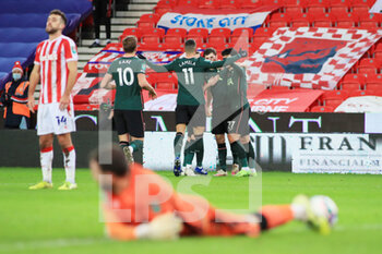 2020-12-23 - Tottenham Hotspur players celebrate after Tottenham Hotspur defender Ben Davies (33) (hidden) scored to make it 2-1 during the English League Cup, EFL Cup quarter-final football match between Stoke City and Tottenham Hotspur on December 23, 2020 at the Bet365 Stadium in Stoke-on-Trent, England - Photo kevin Warburton - A Moment in Sport / ProSportsImages / DPPI - STOKE CITY VS TOTTENHAM HOTSPUR - ENGLISH LEAGUE CUP - SOCCER