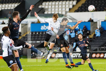 2021-02-10 - Swansea City midfielder Jay Fulton (6) goes close with a header during the English Cup, FA Cup 5th round football match between Swansea City and Manchester City on February 10, 2021 at the Liberty Stadium in Swansea, Wales - Photo Gruffydd Thomas / ProSportsImages / DPPI - SWANSEA CITY AND MANCHESTER CITY - ENGLISH LEAGUE CUP - SOCCER