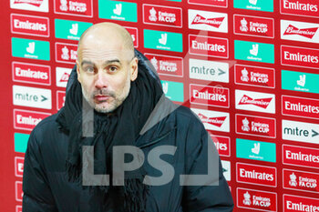2021-02-10 - Manchester City manager Pep Guardiola speaks to the press after the English Cup, FA Cup 5th round football match between Swansea City and Manchester City on February 10, 2021 at the Liberty Stadium in Swansea, Wales - Photo Gruffydd Thomas / ProSportsImages / DPPI - SWANSEA CITY AND MANCHESTER CITY - ENGLISH LEAGUE CUP - SOCCER