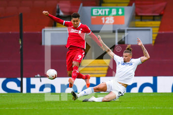 2020-09-12 - Leeds United midfielder Kalvin Phillips (23) tackles Liverpool forward Roberto Firmino (9) during the English championship Premier League football match between Liverpool and Leeds United on September 12, 2020 at Anfield in Liverpool, England - Photo Malcolm Bryce / ProSportsImages / DPPI - LIVERPOOL VS LEEDS UNITED - ENGLISH PREMIER LEAGUE - SOCCER