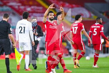 2020-09-12 - Liverpool forward Mohamed Salah (11) gestures for his hat-trick ball after the English championship Premier League football match between Liverpool and Leeds United on September 12, 2020 at Anfield in Liverpool, England - Photo Malcolm Bryce / ProSportsImages / DPPI - LIVERPOOL VS LEEDS UNITED - ENGLISH PREMIER LEAGUE - SOCCER