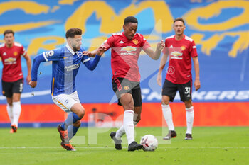 2020-09-26 - Manchester United Forward Anthony Martial battles with Brighton and Hove Albion midfielder Adam Lallana (14) during the English championship Premier League football match between Brighton and Hove Albion and Manchester United on September 26, 2020 at the American Express Community Stadium in Brighton and Hove, England - Photo Phil Duncan / ProSportsImages / DPPI - BRIGHTON AND HOVE ALBION - ENGLISH PREMIER LEAGUE - SOCCER
