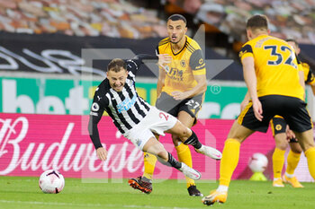 2020-10-25 - Wolverhampton Wanderers defender Romain Saiss (27) tackles Newcastle United midfielder Ryan Fraser (21) during the English championship Premier League football match between Wolverhampton Wanderers and Newcastle United on October 25, 2020 at Molineux in Wolverhampton, England - Photo Nigel Keene / ProSportsImages / DPPI - WOLVERHAMPTON WANDERERS VS NEWCASTLE UNITED - ENGLISH PREMIER LEAGUE - SOCCER