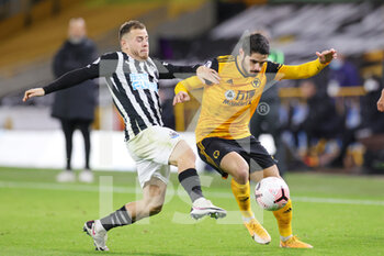 2020-10-25 - Wolverhampton Wanderers midfielder Pedro Neto (7) challenged by Newcastle United midfielder Ryan Fraser (21) during the English championship Premier League football match between Wolverhampton Wanderers and Newcastle United on October 25, 2020 at Molineux in Wolverhampton, England - Photo Nigel Keene / ProSportsImages / DPPI - WOLVERHAMPTON WANDERERS VS NEWCASTLE UNITED - ENGLISH PREMIER LEAGUE - SOCCER