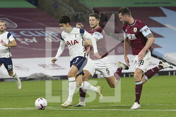 2020-10-26 - Tottenham Hotspur forward Son Heung-Min (7) through on goal as he is chased down by Burnley defender James Tarkowski (5) and Burnley defender Kevin Long (28) during the English championship Premier League football match between Burnley and Tottenham Hotspur on October 26, 2020 at Turf Moor in Burnley, England - Photo Craig Galloway / ProSportsImages / DPPI - BURNLEY VS TOTTENHAM HOTSPUR - ENGLISH PREMIER LEAGUE - SOCCER