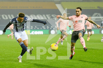 2020-11-28 - West Bromwich Albion forward Callum Robinson (7) takes a shot at goal under pressure from Sheffield United defender Kean Bryan (29) during the English championship Premier League football match between West Bromwich Albion and Sheffield United on November 28, 2020 at The Hawthorns in West Bromwich, England - Photo Dennis Goodwin / ProSportsImages / DPPI - WEST BROMWICH ALBION VS SHEFFIELD UNITED - ENGLISH PREMIER LEAGUE - SOCCER