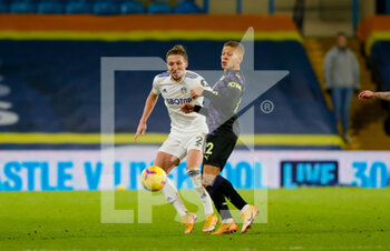 2020-12-16 - Leeds United defender Luke Ayling (2) and Dwight Gayle of Newcastle during the English championship Premier League football match between Leeds United and Newcastle United on December 16, 2020 at Elland Road in Leeds, England - Photo Simon Davies / ProSportsImages / DPPI - LEEDS UNITED VS NEWCASTLE UNITED - ENGLISH PREMIER LEAGUE - SOCCER