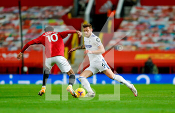 2020-12-20 - Leeds United defender Liam Cooper and Marcus Rashford of Manchester United during the English championship Premier League football match between Manchester United and Leeds United on December 20, 2020 at Old Trafford in Manchester, England - Photo Simon Davies / ProSportsImages / DPPI - MANCHESTER UNITED VS LEEDS UNITED - ENGLISH PREMIER LEAGUE - SOCCER