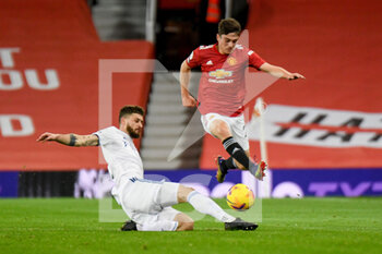 2020-12-20 - Leeds United midfielder Mateusz Klich (43) tackles Manchester United midfielder Daniel James (21) during the English championship Premier League football match between Manchester United and Leeds United on December 20, 2020 at Old Trafford in Manchester, England - Photo Malcolm Bryce / ProSportsImages / DPPI - MANCHESTER UNITED VS LEEDS UNITED - ENGLISH PREMIER LEAGUE - SOCCER