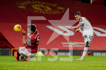 2020-12-20 - Leeds United midfielder Jack Harrison (22) takes a shot during the English championship Premier League football match between Manchester United and Leeds United on December 20, 2020 at Old Trafford in Manchester, England - Photo Malcolm Bryce / ProSportsImages / DPPI - MANCHESTER UNITED VS LEEDS UNITED - ENGLISH PREMIER LEAGUE - SOCCER