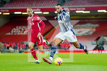 2020-12-27 - West Bromwich Albion midfielder Matt Phillips (10) takes a shot as Liverpool midfielder Fabinho (3) watches on during the English championship Premier League football match between Liverpool and West Bromwich Albion on December 27, 2020 at Anfield in Liverpool, England - Photo Malcolm Bryce / ProSportsImages / DPPI - LIVERPOOL VS WEST BROMWICH ALBION - ENGLISH PREMIER LEAGUE - SOCCER