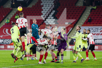 2021-01-12 - Sheffield United defender Phil Jagielka (15) heads the ball clear during the English championship Premier League football match between Sheffield United and Newcastle United on January 12, 2021 at Bramall Lane in Sheffield, England - Photo kevin Warburton / A Moment in Sport / ProSportsImages / DPPI - SHEFFIELD UNITED VS NEWCASTLE UNITED - ENGLISH PREMIER LEAGUE - SOCCER