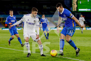 2021-01-16 - Leeds United midfielder Mateusz Klich (43) and Brighton and Hove Albion defender Lewis Dunk (5) in action during the English championship Premier League football match between Leeds United and Brighton and Hove Albion on January 16, 2021 at Elland Road in Leeds, England - Photo Simon Davies / ProSportsImages / DPPI - LEEDS UNITED AND BRIGHTON AND HOVE ALBION - ENGLISH PREMIER LEAGUE - SOCCER