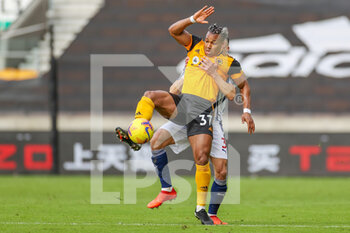 2021-01-16 - Adama Traore (37) of Wolverhampton Wanderers held by Kieran Gibbs (3) of West Bromwich Albion during the English championship Premier League football match between Wolverhampton Wanderers and West Bromwich Albion on January 16, 2021 at Molineux stadium in Wolverhampton, England - Photo Nigel Keene / ProSportsImages / DPPI - WOLVERHAMPTON WANDERERS VS WEST BROMWICH ALBION - ENGLISH PREMIER LEAGUE - SOCCER