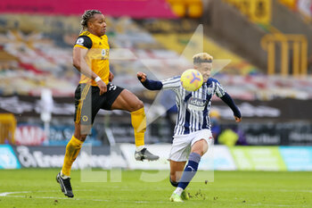 2021-01-16 - Callum Robinson (7) of West Bromwich Albion battles with Adama Traore (37) of Wolverhampton Wanderers during the English championship Premier League football match between Wolverhampton Wanderers and West Bromwich Albion on January 16, 2021 at Molineux stadium in Wolverhampton, England - Photo Nigel Keene / ProSportsImages / DPPI - WOLVERHAMPTON WANDERERS VS WEST BROMWICH ALBION - ENGLISH PREMIER LEAGUE - SOCCER