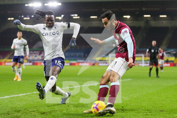 2021-01-27 - Burnley midfielder Dwight McNeil (11) and Aston Villa forward Bertrand Traore during the English championship Premier League football match between Burnley and Aston Villa on January 27, 2021 at Turf Moor in Burnley, England - Photo Kevin Warburton / A Moment in Sport / ProSportsImages / DPPI - BURNLEY AND ASTON VILLA - ENGLISH PREMIER LEAGUE - SOCCER