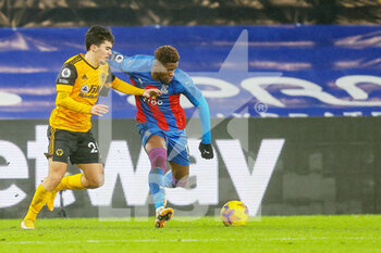 2021-01-30 - Wolverhampton Wanderers midfielder Vitinha (20) and Crystal Palace forward Wilfried Zaha (11) battle for the ball during the English championship Premier League football match between Crystal Palace and Wolverhampton Wanderers on January 30, 2021 at Selhurst Park in London, England - Photo Toyin Oshodi / ProSportsImages / DPPI - CRYSTAL PALACE AND WOLVERHAMPTON WANDERERS - ENGLISH PREMIER LEAGUE - SOCCER
