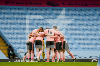 2021-01-30 - Sheffield United players huddle during the English championship Premier League football match between Manchester City and Sheffield United on January 30, 2021 at the Etihad Stadium in Manchester, England - Photo Malcolm Bryce / ProSportsImages / DPPI - MANCHESTER CITY AND SHEFFIELD UNITED - ENGLISH PREMIER LEAGUE - SOCCER