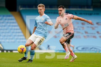 2021-01-30 - Manchester City defender Oleksandr Zinchenko (11) and Sheffield United defender George Baldock (2) in action during the English championship Premier League football match between Manchester City and Sheffield United on January 30, 2021 at the Etihad Stadium in Manchester, England - Photo Malcolm Bryce / ProSportsImages / DPPI - MANCHESTER CITY AND SHEFFIELD UNITED - ENGLISH PREMIER LEAGUE - SOCCER
