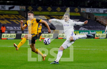 2021-02-19 - Leeds United defender Pascal Struijk (21) shoots on goal, Leander Dendoncker of Wolverhampton during the English championship Premier League football match between Wolverhampton Wanderers and Leeds United on February 19, 2021 at Molineux stadium in Wolverhampton, England - Photo Simon Davies / ProSportsImages / DPPI - WOLVERHAMPTON WANDERERS AND LEEDS UNITED - ITALIAN SERIE A - SOCCER