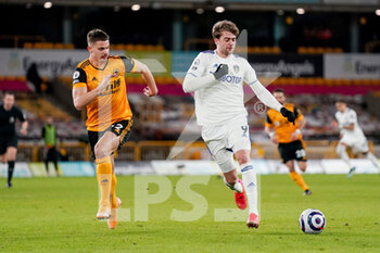 2021-02-19 - Leeds United forward Patrick Bamford (9) and Wolverhampton Wanderers midfielder Leander Dendoncker (32) in action during the English championship Premier League football match between Wolverhampton Wanderers and Leeds United on February 19, 2021 at Molineux stadium in Wolverhampton, England - Photo Malcolm Bryce / ProSportsImages / DPPI - WOLVERHAMPTON WANDERERS AND LEEDS UNITED - ITALIAN SERIE A - SOCCER