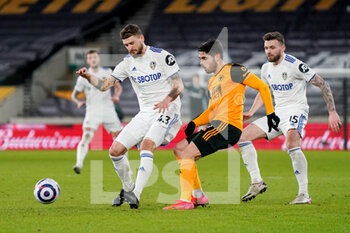 2021-02-19 - Leeds United midfielder Mateusz Klich and Wolverhampton Wanderers midfielder Pedro Neto during the English championship Premier League football match between Wolverhampton Wanderers and Leeds United on February 19, 2021 at Molineux stadium in Wolverhampton, England - Photo Malcolm Bryce / ProSportsImages / DPPI - WOLVERHAMPTON WANDERERS AND LEEDS UNITED - ITALIAN SERIE A - SOCCER