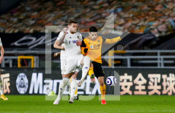 2021-02-19 - Leeds United defender Liam Cooper battles with Pedro Neto of Wolverhampton during the English championship Premier League football match between Wolverhampton Wanderers and Leeds United on February 19, 2021 at Molineux stadium in Wolverhampton, England - Photo Simon Davies / ProSportsImages / DPPI - WOLVERHAMPTON WANDERERS AND LEEDS UNITED - ITALIAN SERIE A - SOCCER