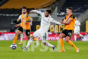 2021-02-19 - Leeds United forward Tyler Roberts and Ruben Neves, Leander Dendoncker of Wolverhampton during the English championship Premier League football match between Wolverhampton Wanderers and Leeds United on February 19, 2021 at Molineux stadium in Wolverhampton, England - Photo Malcolm Bryce / ProSportsImages / DPPI - WOLVERHAMPTON WANDERERS AND LEEDS UNITED - ITALIAN SERIE A - SOCCER