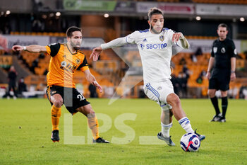 2021-02-19 - Leeds United forward Tyler Roberts and Joao Moutinho of Wolverhampton during the English championship Premier League football match between Wolverhampton Wanderers and Leeds United on February 19, 2021 at Molineux stadium in Wolverhampton, England - Photo Malcolm Bryce / ProSportsImages / DPPI - WOLVERHAMPTON WANDERERS AND LEEDS UNITED - ITALIAN SERIE A - SOCCER