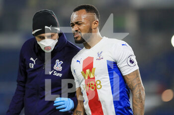 2021-02-22 - Crystal Palace forward Jordan Ayew injured during the English championship Premier League football match between Brighton and Hove Albion and Crystal Palace on February 22, 2021 at the American Express Community Stadium in Brighton and Hove, England - Photo Phil Duncan / ProSportsImages / DPPI - BRIGHTON AND HOVE ALBION AND CRYSTAL PALACE - ENGLISH PREMIER LEAGUE - SOCCER