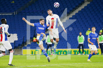 2021-02-22 - Crystal Palace defender Gary Cahill battles for a header with Brighton and Hove Albion forward Neal Maupay (9) during the English championship Premier League football match between Brighton and Hove Albion and Crystal Palace on February 22, 2021 at the American Express Community Stadium in Brighton and Hove, England - Photo Phil Duncan / ProSportsImages / DPPI - BRIGHTON AND HOVE ALBION AND CRYSTAL PALACE - ENGLISH PREMIER LEAGUE - SOCCER