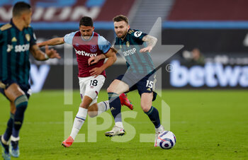 2021-03-08 - Pablo Fornals of West Ham and Leeds United defender Stuart Dallas (15) during the English championship Premier League football match between West Ham United and Leeds United on March 8, 2021 at the London Stadium in London, England - Photo Simon Davies / ProSportsImages / DPPI - WEST HAM UNITED AND LEEDS UNITED - ENGLISH PREMIER LEAGUE - SOCCER