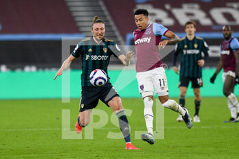 2021-03-08 - Leeds United defender Luke Ayling (2) and West Ham United midfielder Jesse Lingard (11) in action during the English championship Premier League football match between West Ham United and Leeds United on March 8, 2021 at the London Stadium in London, England - Photo Malcolm Bryce / ProSportsImages / DPPI - WEST HAM UNITED AND LEEDS UNITED - ENGLISH PREMIER LEAGUE - SOCCER